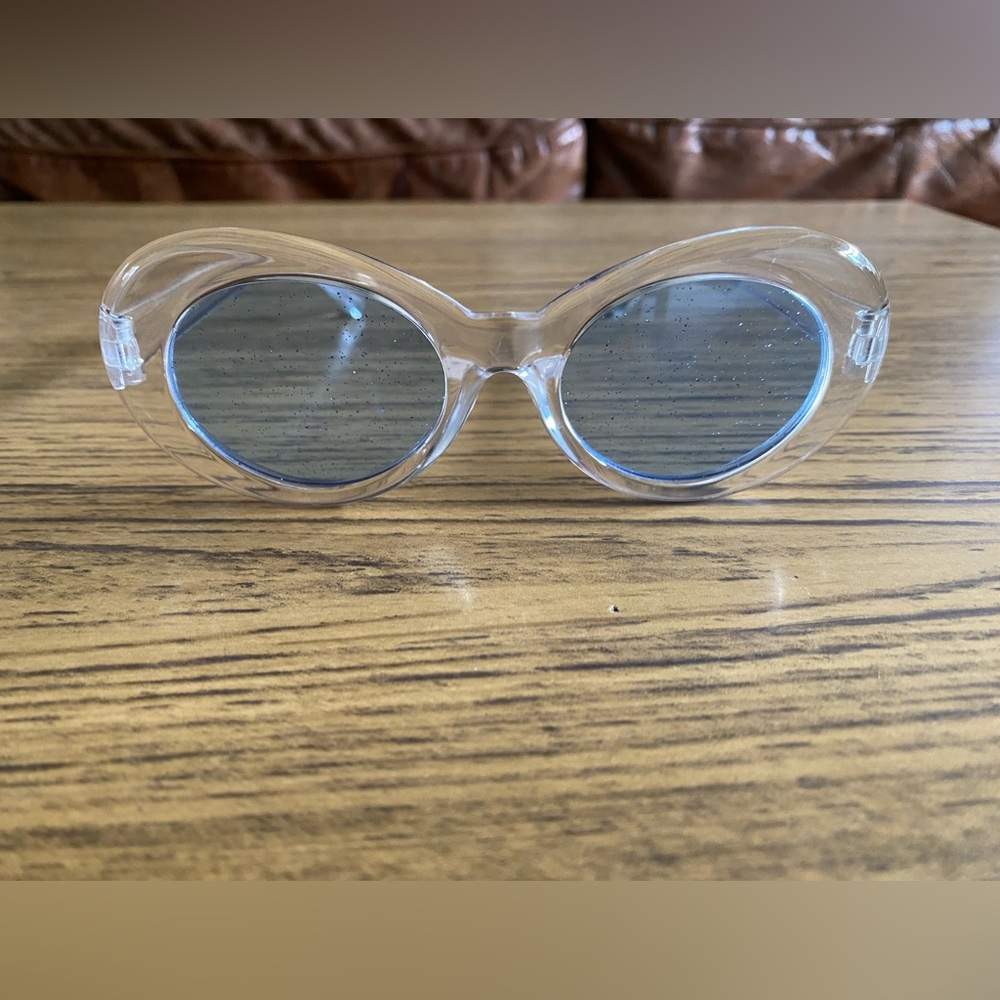 Clear Oval Sunglasses with Blue Lenses